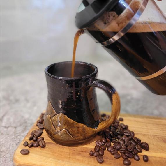 Coffee pouring from a french press